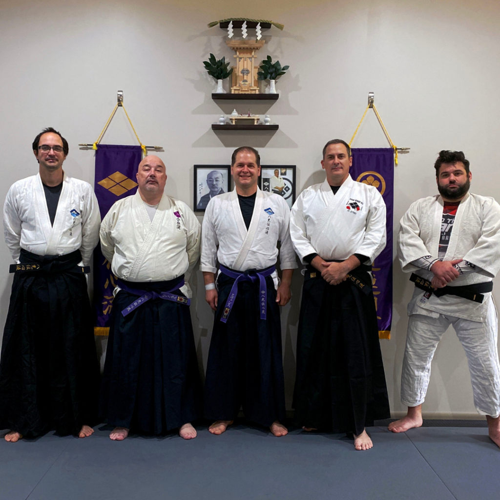 Koyama's Head Instructor and students in front of new shinden